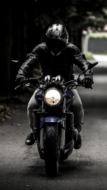 A street bike rider wearing a helmet rides a blue motorcycle on a shaded path, HD Mobile Wallpaper