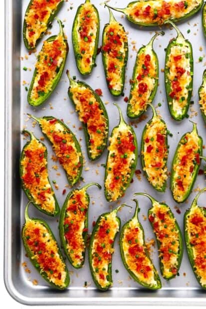 A tray of jalapeno peppers stuffed with cheese, bacon, and herbs ready to bake, HD Phone Wallpaper