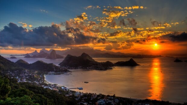 The Rio De Janerio wallpapers capture a breathtaking sunset over the bay and mountains, 4K Desktop Wallpaper