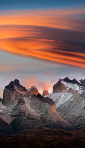 The fiery sunset lights up the rocky peaks of Torres Del Paine National Park, HD Phone Wallpaper