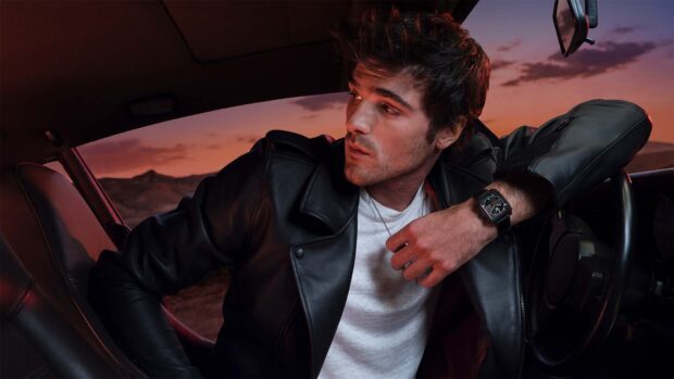Jacob Elordi Wallpapers show him sitting in a car at sunset, HD Desktop Wallpaper