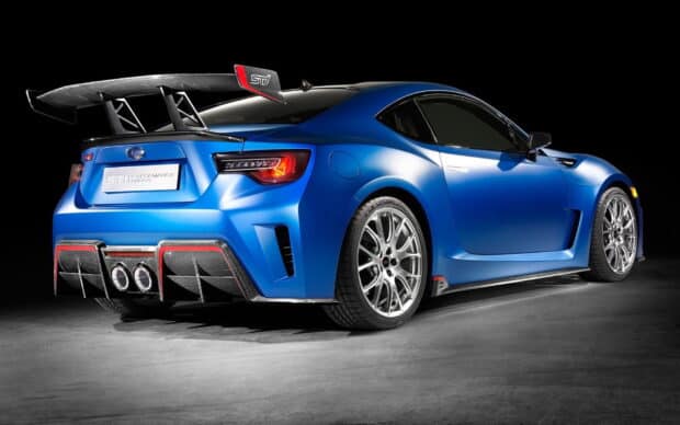 A blue Subaru Brz with performance modifications is shown on a dark background, HD Desktop Wallpaper
