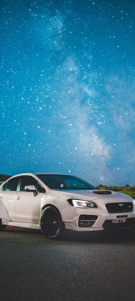 A white Subaru Wrx is parked under a bright starry sky at night, HD Phone Wallpaper