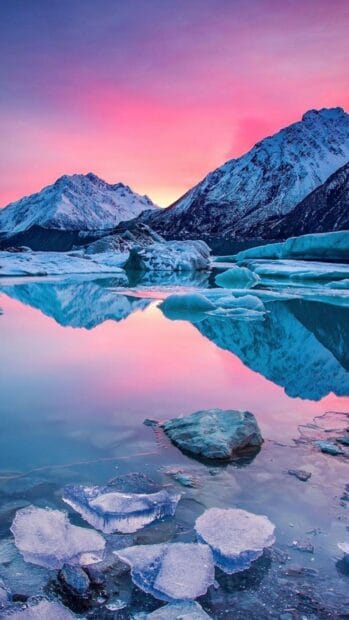 The glacier reflects beautiful colors during sunset in the cold mountain area, HD Mobile Wallpaper