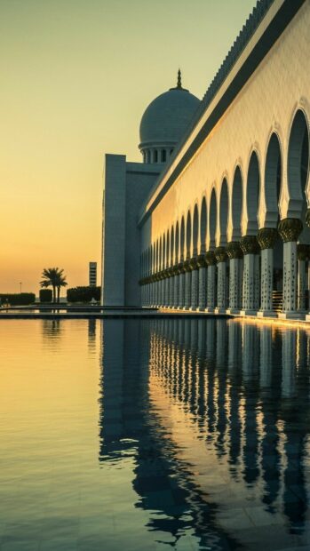 The United Arab Emirates Wallpapers feature a mosque reflecting in the water during sunset, HD Phone Wallpaper