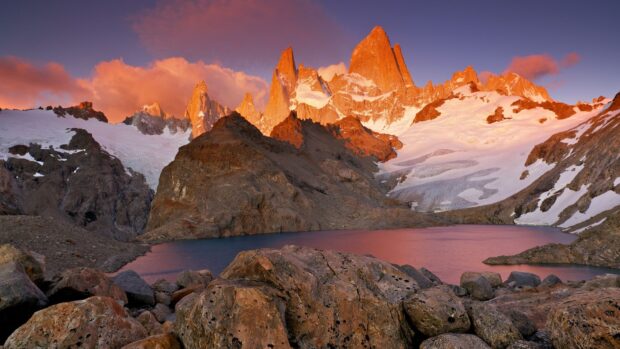 The sunset lights up the rocky mountains and lake at Torres Del Paine National Park, HD Desktop Wallpaper