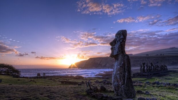 The Easter Island statues stand tall at sunset on the coast with a colorful sky, HD Desktop Wallpaper