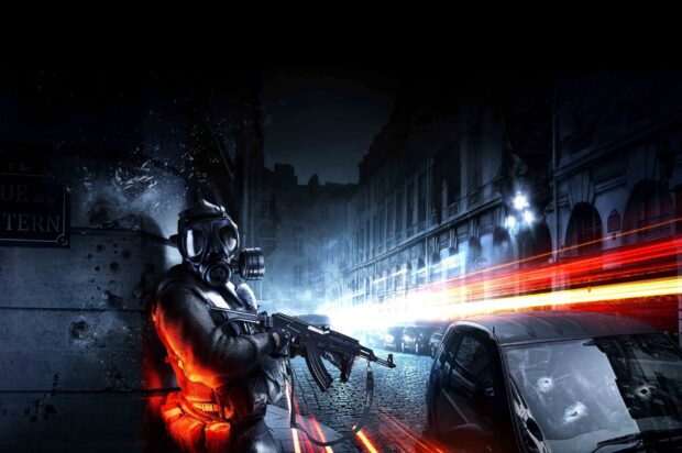 A soldier in a gas mask aims a rifle on a dark city street with bullet holes and light trails, 2K Desktop Wallpaper