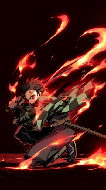 Tanjiro performs a fiery sword attack with flames swirling around him in intense action, 4K Phone Wallpaper