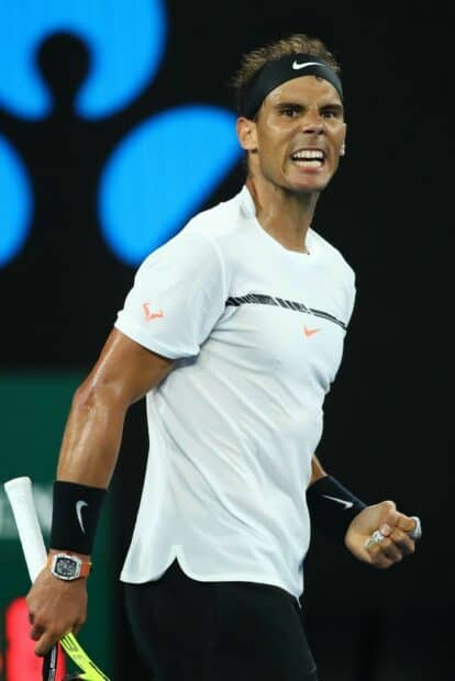 A tennis player shows intense emotion during a match, HD Mobile Wallpaper