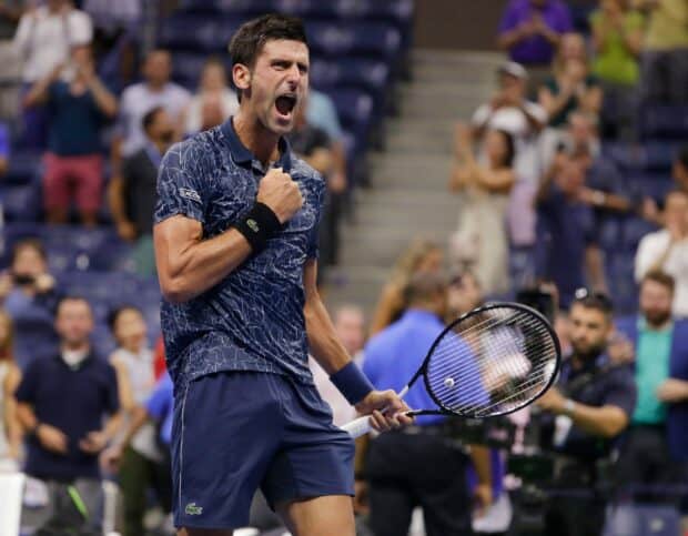A tennis player celebrates a winning point during a match, 2K Desktop Wallpaper