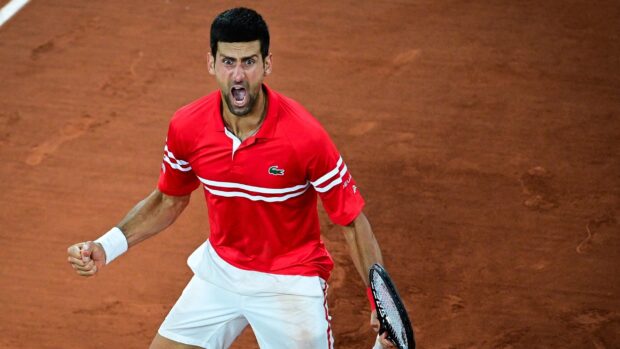 A tennis player shows intense emotion during a match at French Open Roland Garros, 2K Desktop Wallpaper