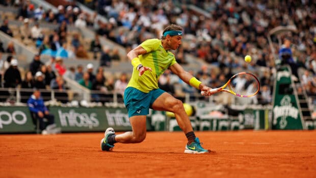 A tennis player competes fiercely during the French Open Roland Garros match, HD Desktop Wallpaper