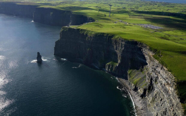 The Aran Islands showcase steep cliffs overlooking the deep ocean, HD Desktop Wallpaper
