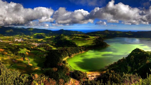 The Azores feature lush green hills and a scenic lake under a vibrant sky, HD Desktop Wallpaper