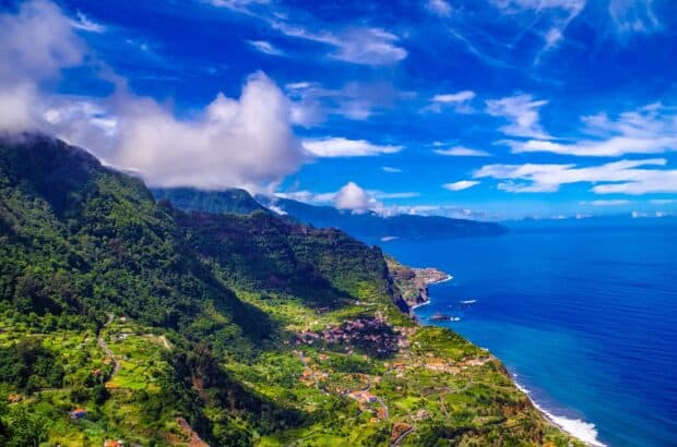 The Azores features lush green hills and a vast blue ocean under a clear sky, HD Desktop Wallpaper