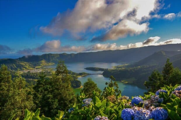 The Azores shows a beautiful lake surrounded by lush green hills under a blue sky, HD Desktop Wallpaper