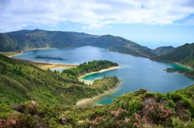 A scenic view of The Azores with a volcanic lake and lush greenery in the foreground, HD Desktop Wallpaper