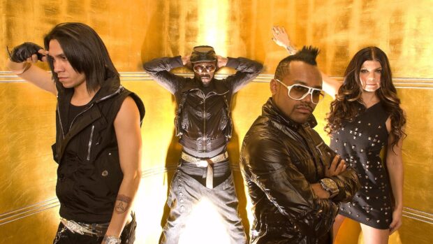 The Black Eyed Peas members posing in stylish outfits against a golden background, HD Desktop Wallpaper