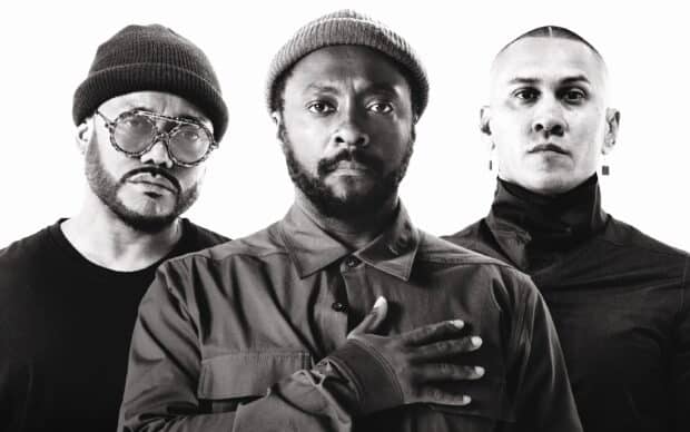 The Black Eyed Peas members stand closely in a black and white image, 2K Desktop Wallpaper