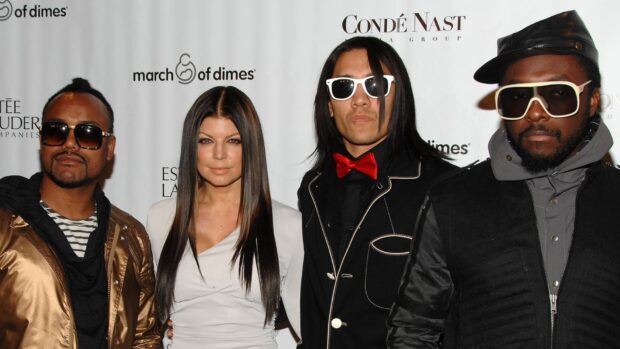 The Black Eyed Peas stand together at an event wearing stylish outfits and sunglasses, HD Desktop Wallpaper