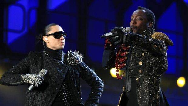 The Black Eyed Peas perform in glittering outfits during a concert, HD Desktop Wallpaper