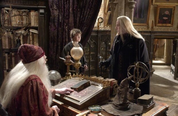 Harry Potter faces Draco Malfoy in an intense scene from The Chamber Of Secrets, HD Desktop Wallpaper