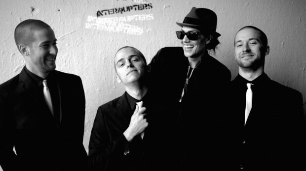 The Interrupters band members posing together in black suits and white ties, HD Desktop Wallpaper