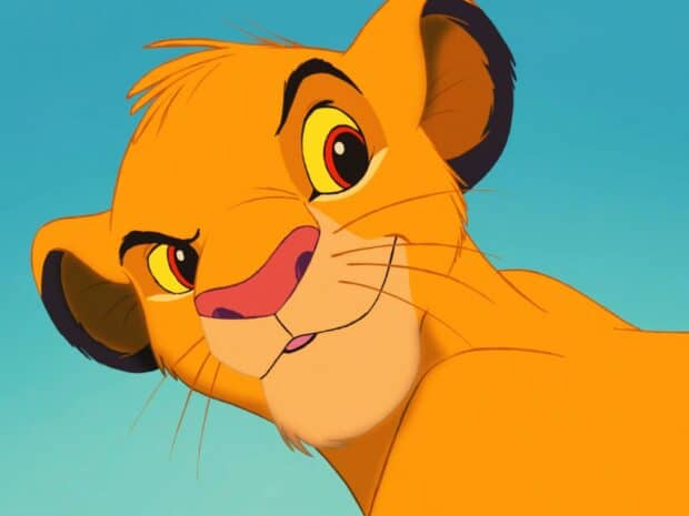 The Lion King character looks curious against a clear blue sky, HD Desktop Wallpaper