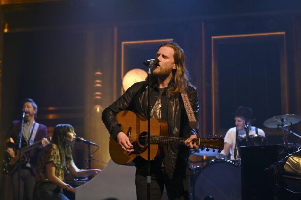 The Lumineers perform live with guitars and drums on stage, HD Desktop Wallpaper
