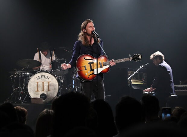 The Lumineers perform live with guitar and piano during a concert, HD Desktop Wallpaper