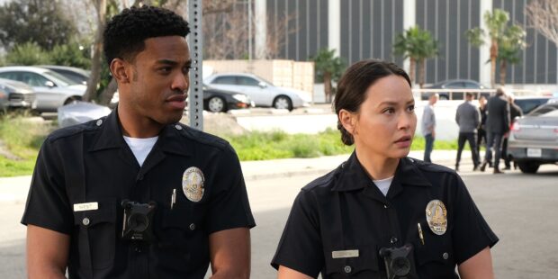 Two police officers from The Rookie TV series stand outdoors discussing a case, HD Desktop Wallpaper