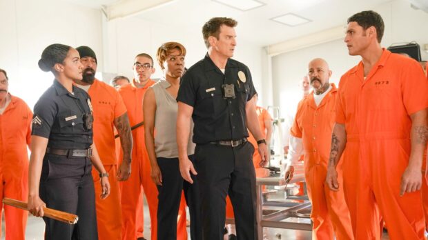 The Rookie Tv Series characters face a tense moment in a prison, 2K Desktop Wallpaper