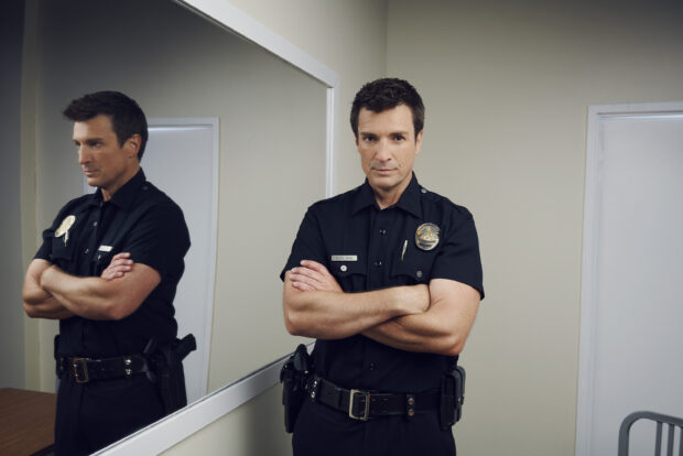 The Rookie Tv Series features a police officer standing with arms crossed, 2K Desktop Wallpaper