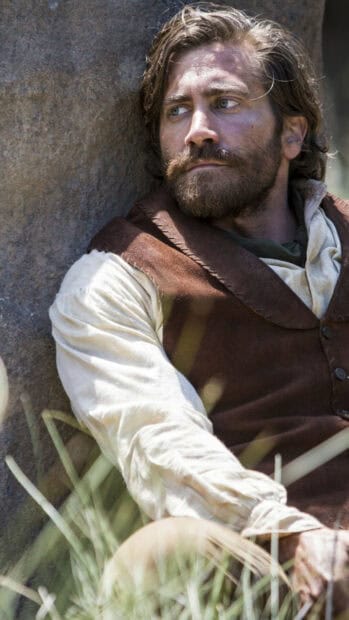 A man sits pensively outdoors in a rustic outfit in The Sisters Brothers, HD Phone Wallpaper