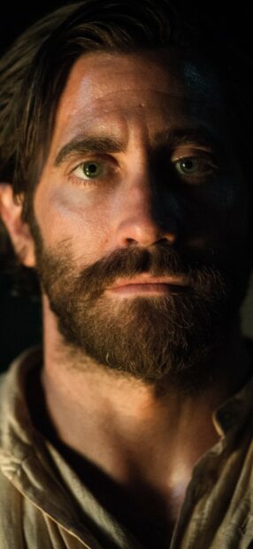 A close up of a man with a beard looking serious in The Sisters Brothers, HD Phone Wallpaper
