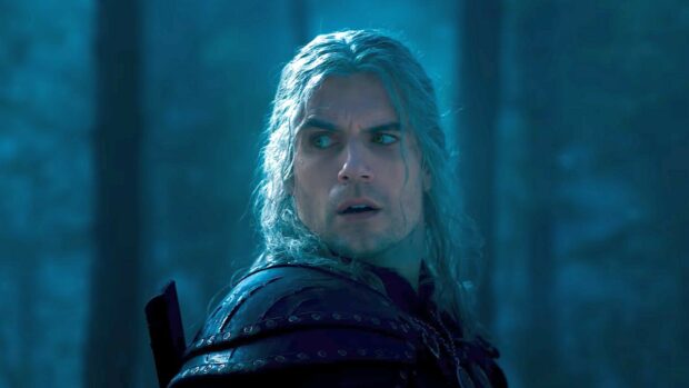 A close up of the Witcher character looking alert in a dark setting from The Witcher Tv Series, HD Desktop Wallpaper