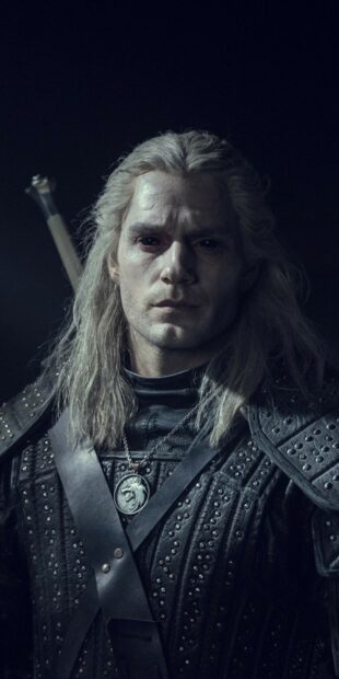 A close up of a man with white hair and black armor from The Witcher Tv Series wallpapers, HD Phone Wallpaper