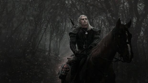 The Witcher Tv Series wallpapers shows a character riding a horse in a snowy dark forest, HD Desktop Wallpaper