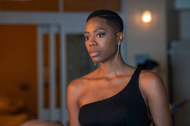 A woman in a black dress expresses deep emotion in this Insecure Tv Series scene, HD Desktop Wallpaper
