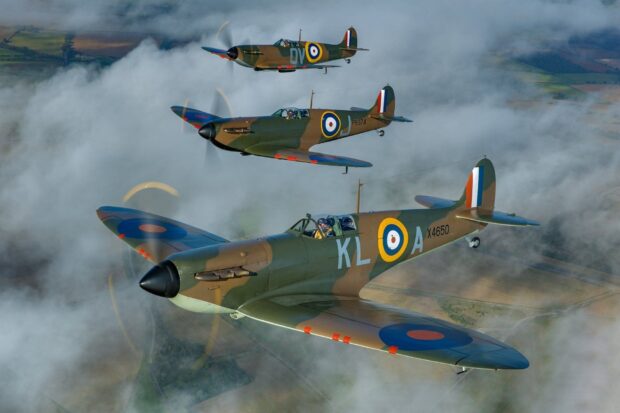 Three Hawker Hurricane planes are flying in formation above the clouds during daylight, HD Desktop Wallpaper