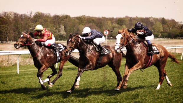 Jockeys compete fiercely in a horse racing event, HD Desktop Wallpaper