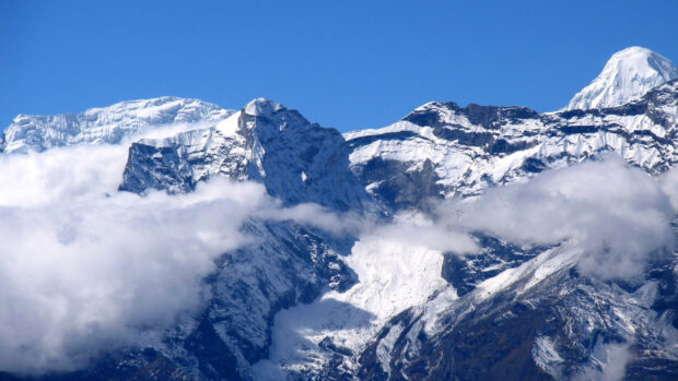 Snow covered peaks rise above clouds in the Tibetan Highlands, HD Desktop Wallpaper
