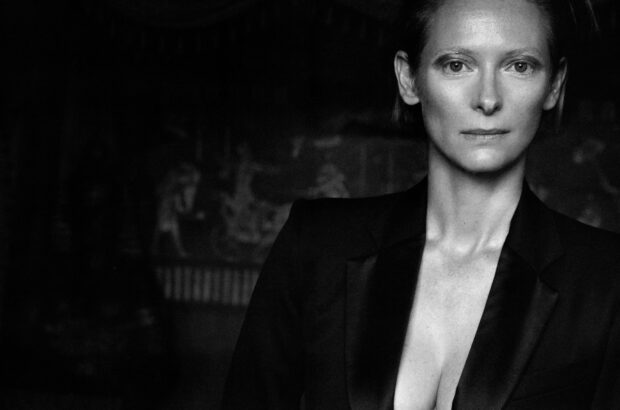 Tilda Swinton is wearing a black suit in this elegant monochrome portrait, HD Desktop Wallpaper