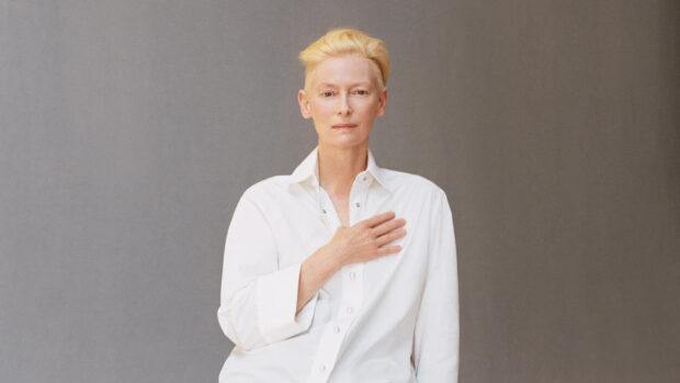 Tilda Swinton wallpapers shows a calm expression with hand placed on chest, HD Desktop Wallpaper