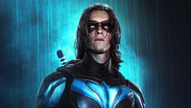 A character from Titans Tv Series is shown with a glowing blue background and mask, HD Desktop Wallpaper