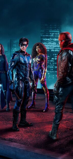 The Titans TV series characters stand ready in a dramatic night city scene, 2K Mobile Wallpaper