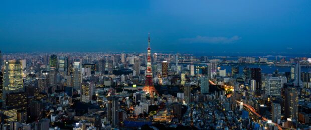 Tokyo Tower stands illuminated in the night cityscape of Tokyo, 2K Desktop Wallpaper