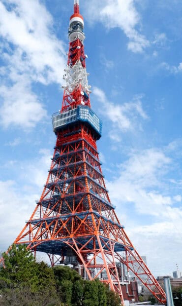 Tokyo Tower stands tall against a bright sky with clouds, HD Mobile Wallpaper