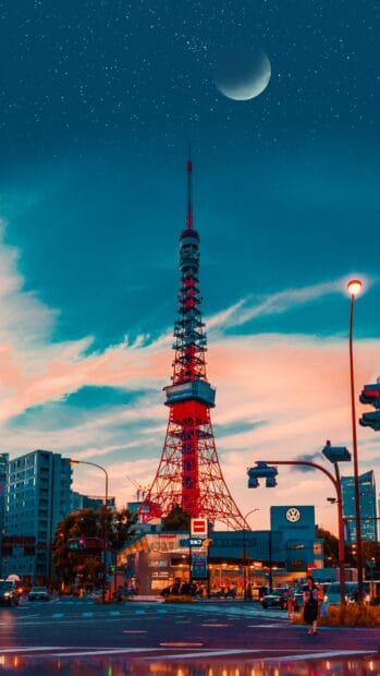 The Tokyo Tower stands tall under a crescent moon and vibrant evening sky, 4K Mobile Wallpaper